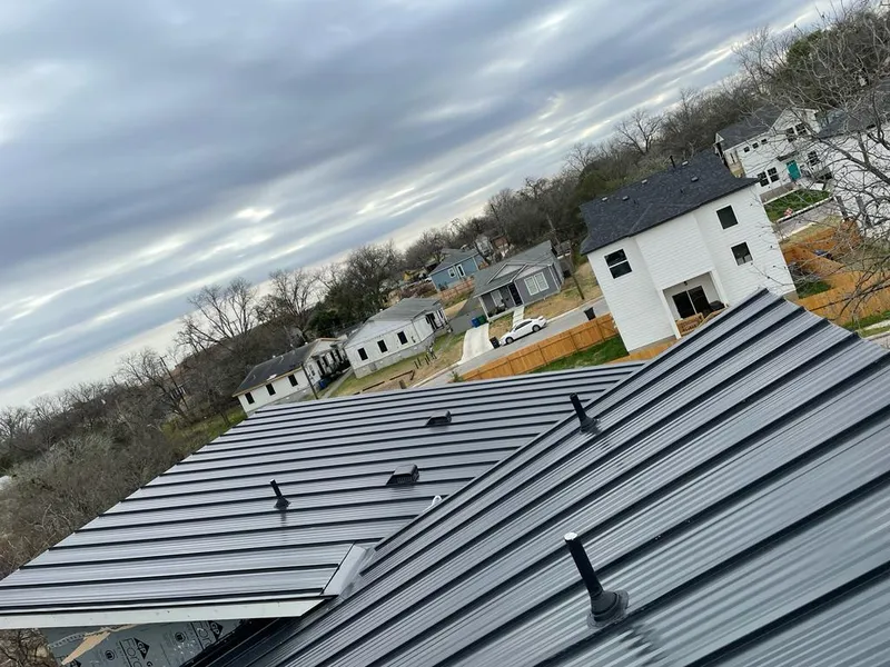 Standing seam metal roof panels with vents for Skylight Repair in Wasco